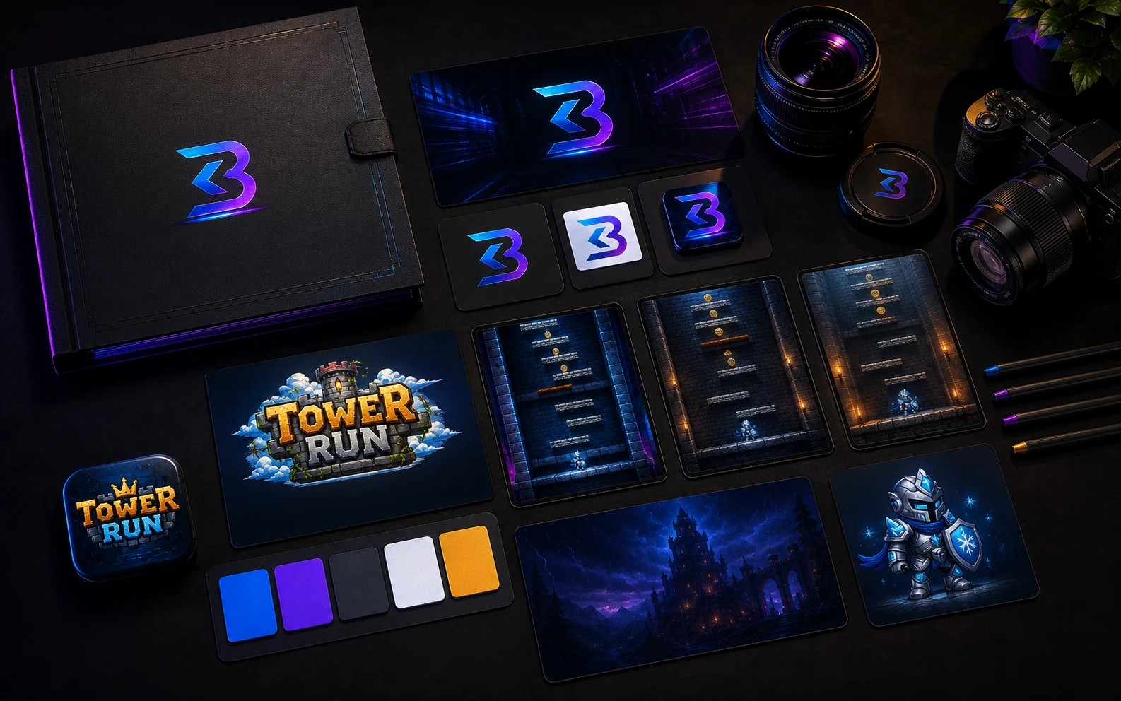 BKaseLabs and TowerRun press kit assets arranged on a dark studio desk